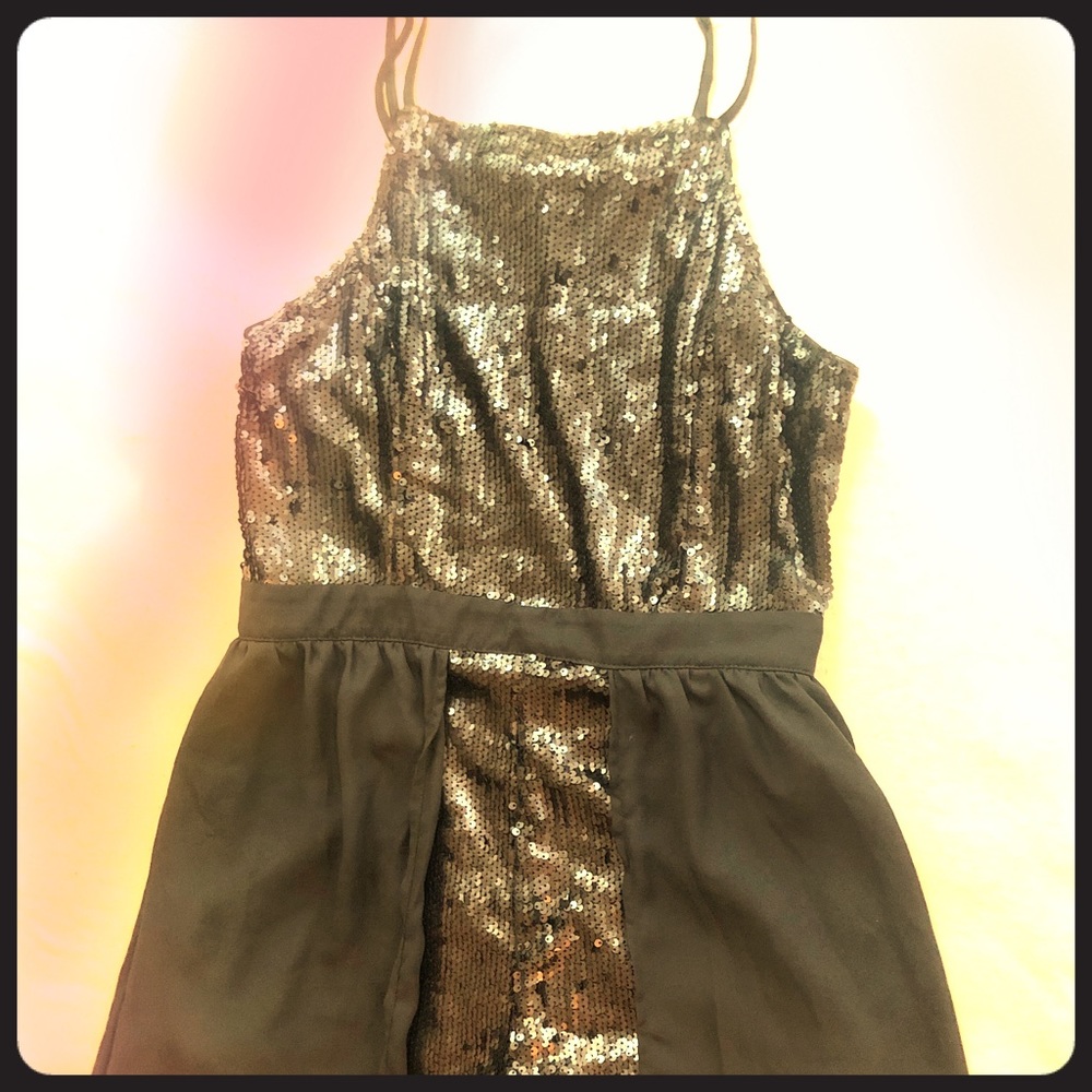 Francesca’s black sequin romper dress